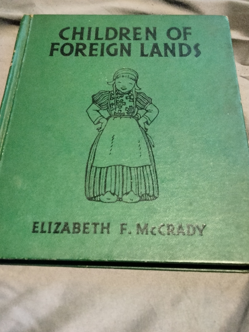 'Children of Foreign Lands' Green Hardcover Book